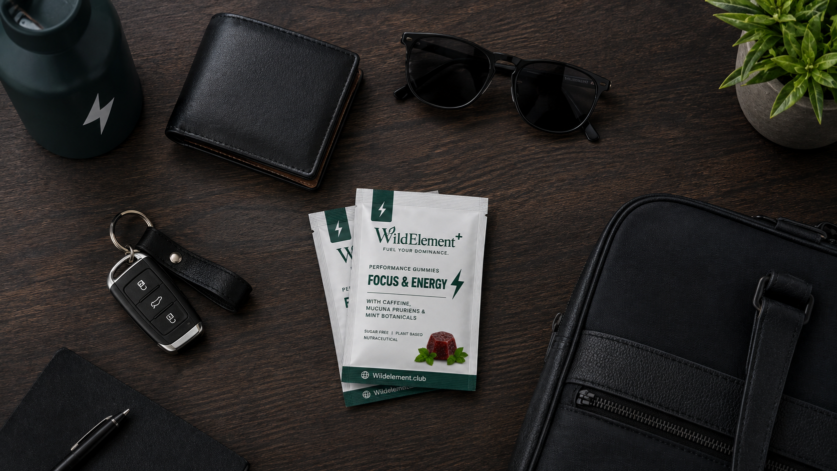 Flat-lay of WildElement sachets with a wallet, keys and everyday carry